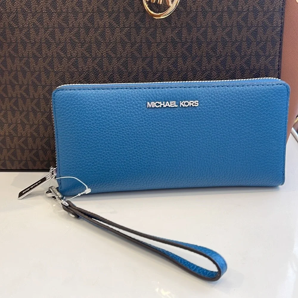 MICHAEL KORS
Leather Continental Wristlet Phone Case Wallet 
Teal
NWT - Picture 2 of 16